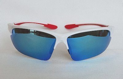 white sunglass blue REVO lens